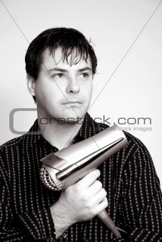 Stylist holding a hair dryer