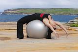 Pilates - ball stretch backwards
