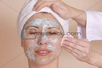 Therapist removing moisture mask