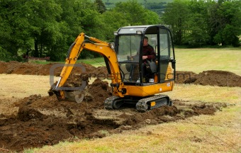 Mini Digger In Action