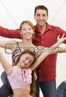 Happy family arms up cheering