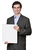 Show and tell, businessman holding white board