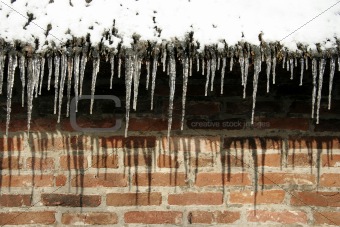 Icicles hanging on roofedge