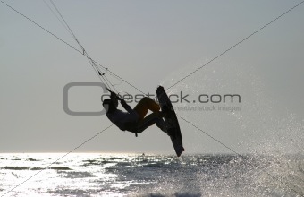 kiteboarder taking off for a jump