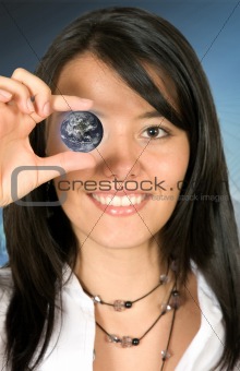 Business woman holding a globe