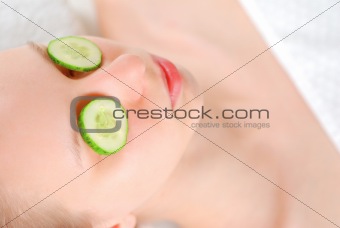 Woman laying on towel