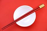 chopsticks and  snd bowl