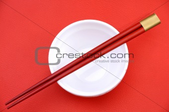 chopsticks and  snd bowl