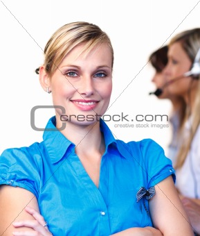 Beautiful businesswoman in a call center 