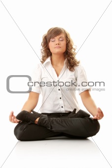Businesswomen meditating in lotus position