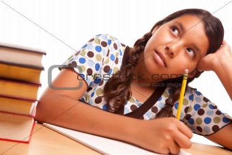 Pretty Hispanic Girl Studying Isolated on a White Background.