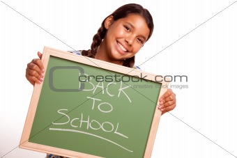 Pretty Hispanic Girl Holding Chalkboard with Back To School Isolated on a White Background.