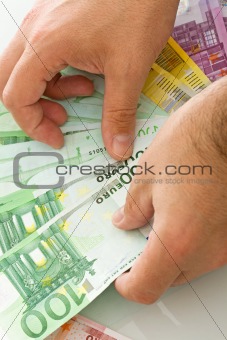 Euro banknotes in the hand