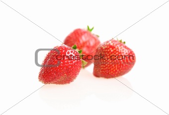 Strawberries over white background