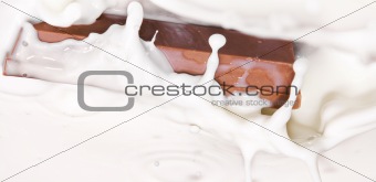 chocolate falling in cream