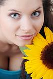Portrait of a Beautiful girl with sunflower