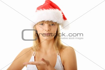 Sensual young woman wearing christmas hat.