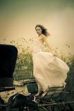 beautiful bride and old  carriage / retro style toned