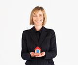 Business woman Holding a House