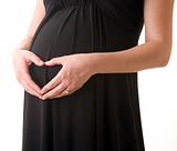 belly of pregnant woman in black dress