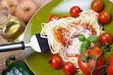 Spaghetti, tomato, cheese and basil