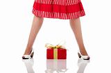 woman legs with a gift