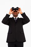 Friendly well-dressed businessman with binoculars 