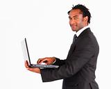 Handsome businessman on laptop