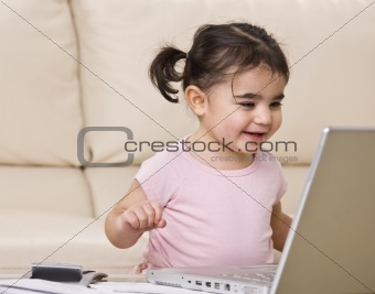 Happy Toddler with Laptop