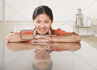 Woman Leaning on Counter