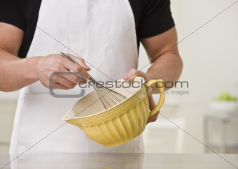 Man with whisk.
