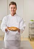 Attractive male with pie.