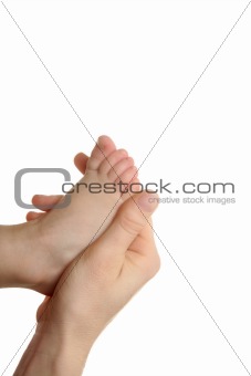 Mother and son, daughter holding feet