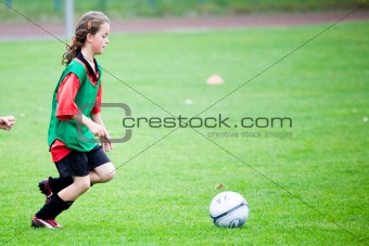 girl playing football
