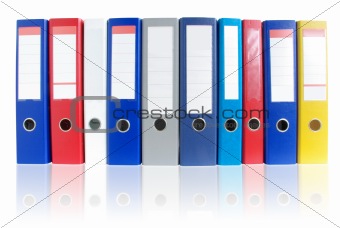 Row of multicolored ring binders