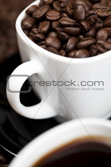 Caffee cup and beans