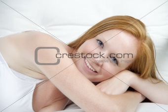 Young woman relaxing with red hair