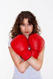young brunette woman with red boxing gloves