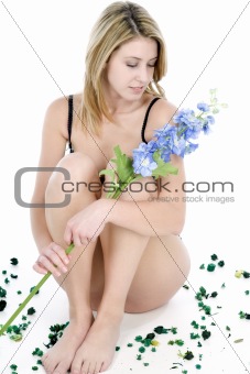 Young woman in underwear sitting