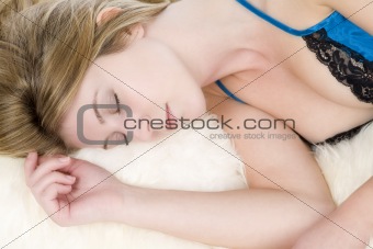 Woman in night dress resting