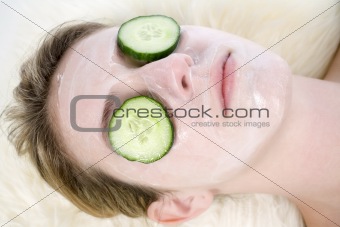 Spa facial with cucumber