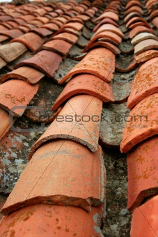 Aged old red clay arabic roof tiles