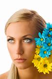 girl and yellow and blue flower