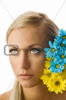 girl and yellow and blue flower