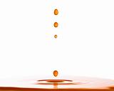 Isolated shot of orange liquid drop