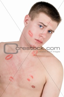 Portrait of the young man in lipstick