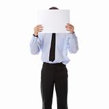Businessman with a blank paper in his face