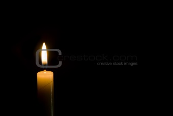 candle on black