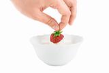 Hand with strawberry