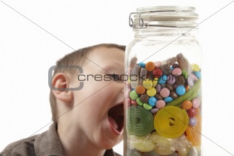 young boy and sweet jar